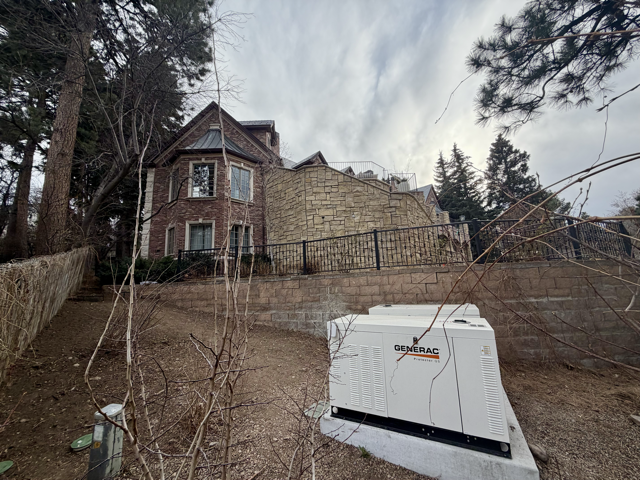 Backup generator installed by Firefly Electrical Services for home power backup.